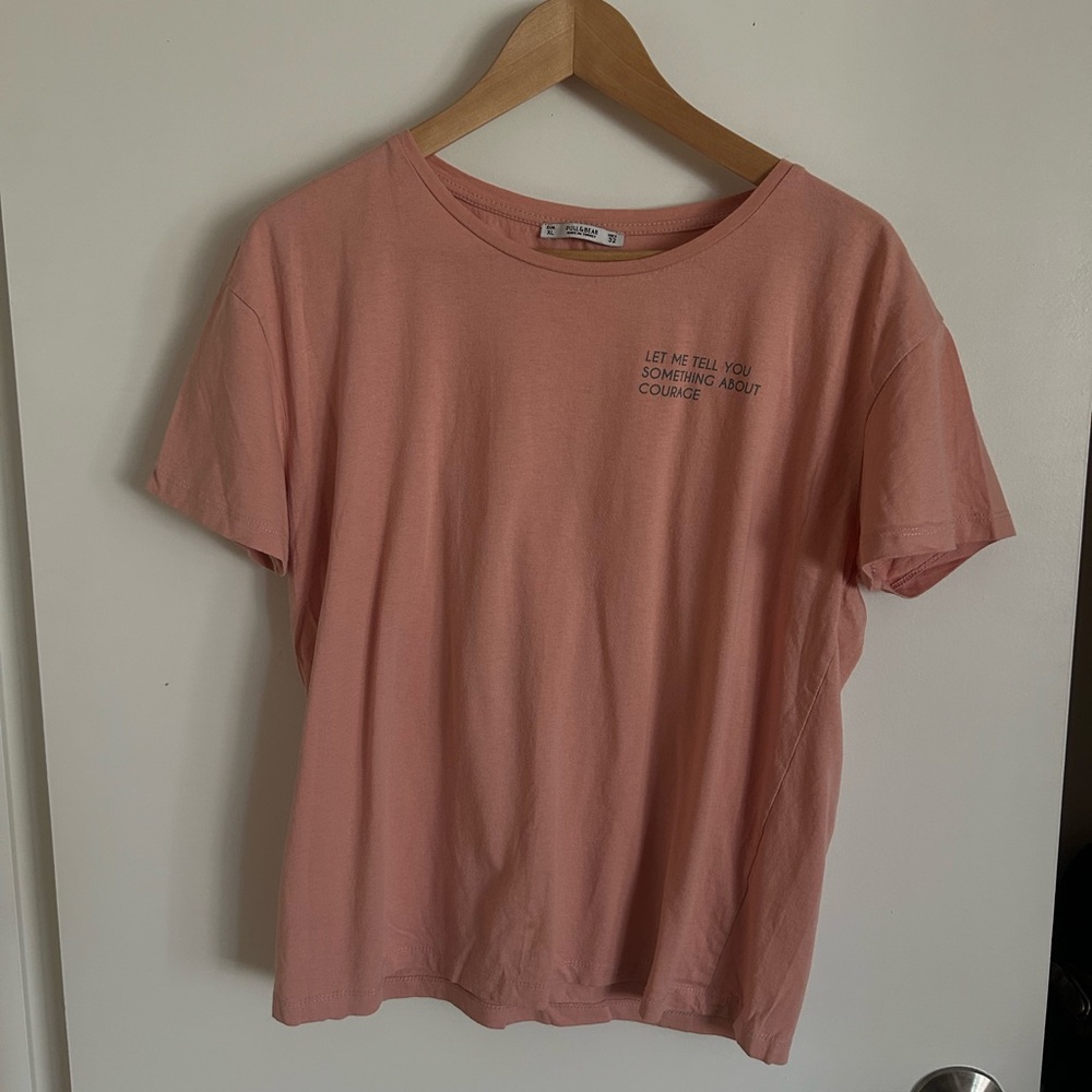 Pink T-Shirt ‘Let me tell you something about courage’